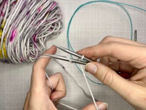 Provisional Cast On Without Crochet Hook: Wrap the yarn down between your needles