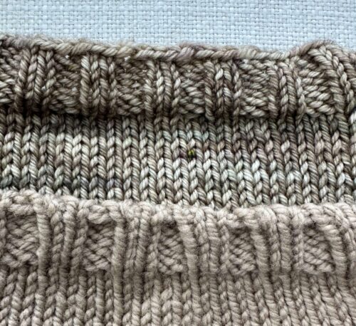 Regular bind off on top, invisible rib bind off on the bottom