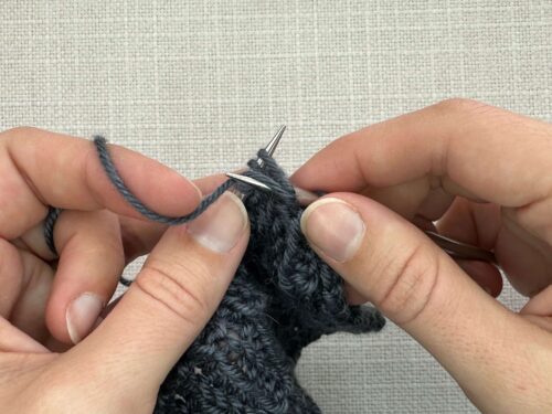 Pb1 in Knitting Step 2. Wrap the working yarn around your needle from bottom to top/front to back (exactly the same way you wrap for every purl stitch).