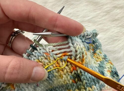 How to Fix a Dropped Stitch in Stockinette: Step 1