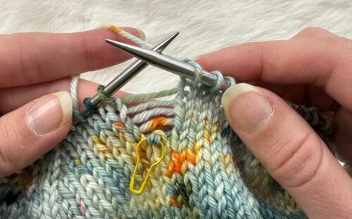 A run in dropped stitches in knitting 