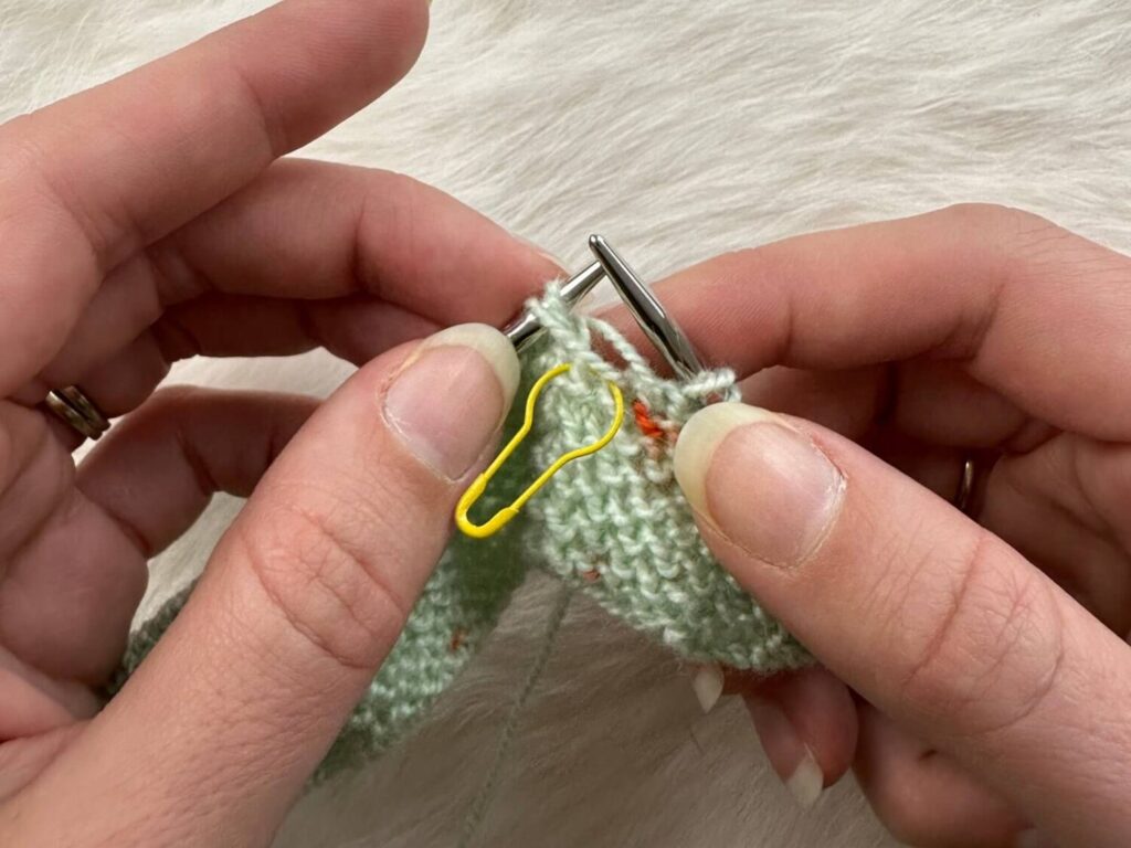 Step 5, place bar to the left of the dropped stitch.